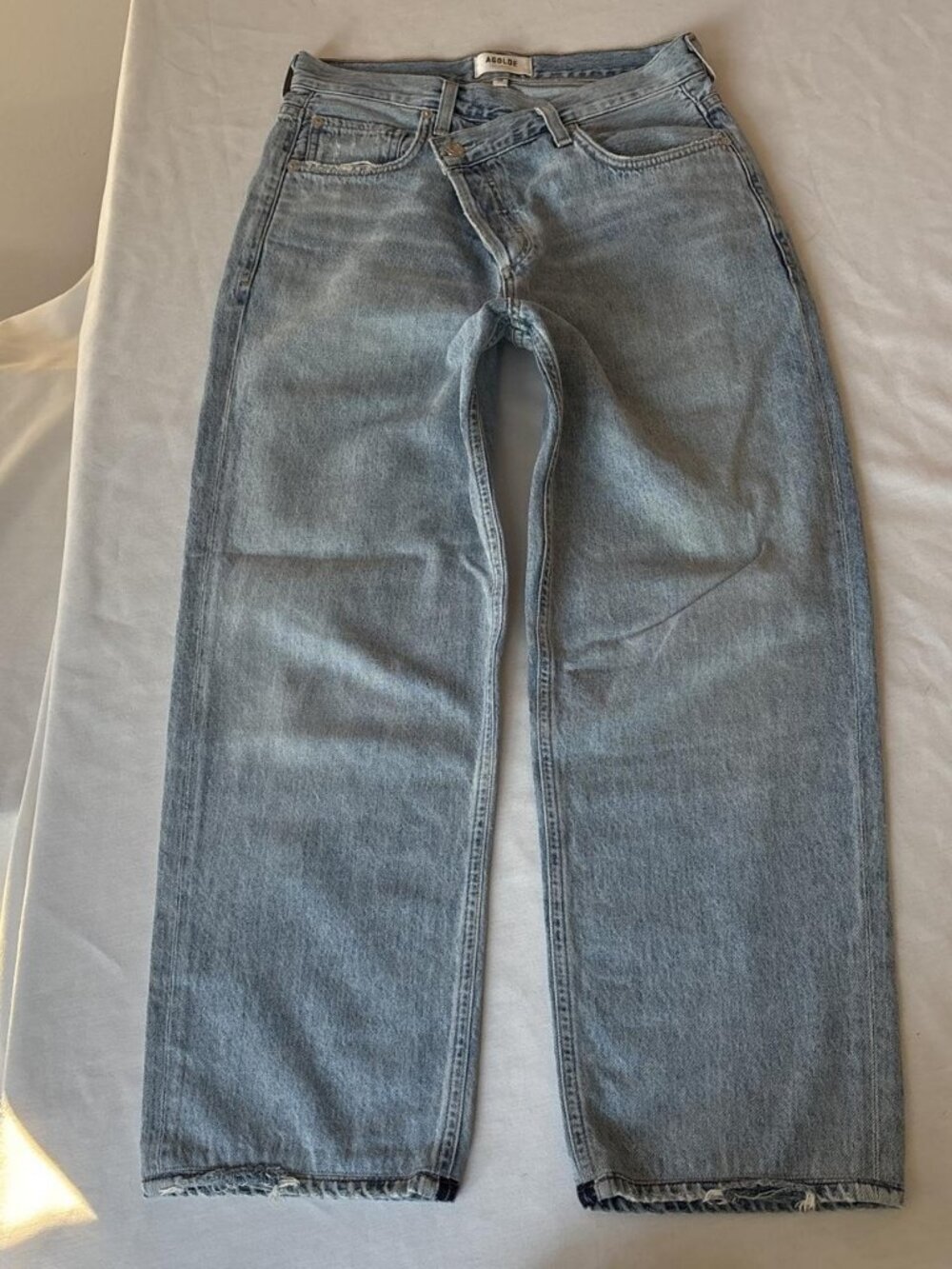 AGOLDE Criss Cross Relaxed Straight Jeans 26 Light Blue Asymmetrical Denim